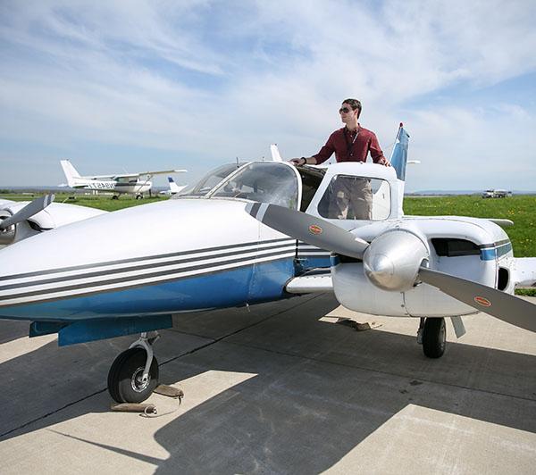 Student Getting into airplane